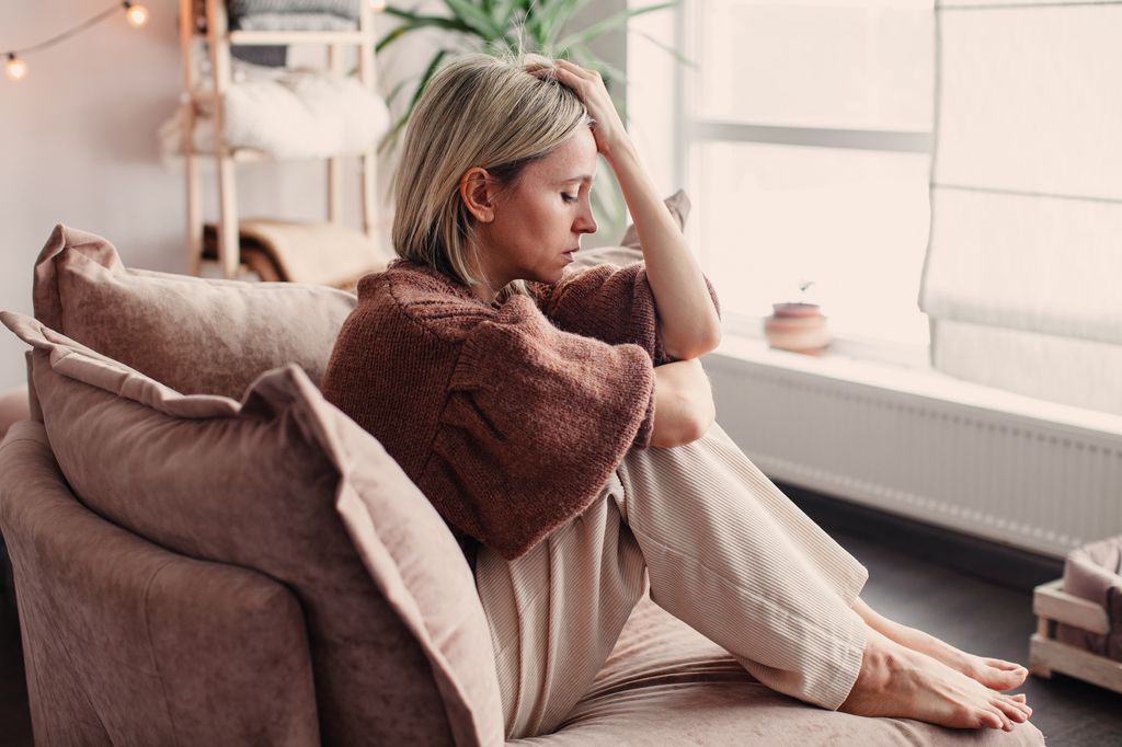depressed insecure woman in living room