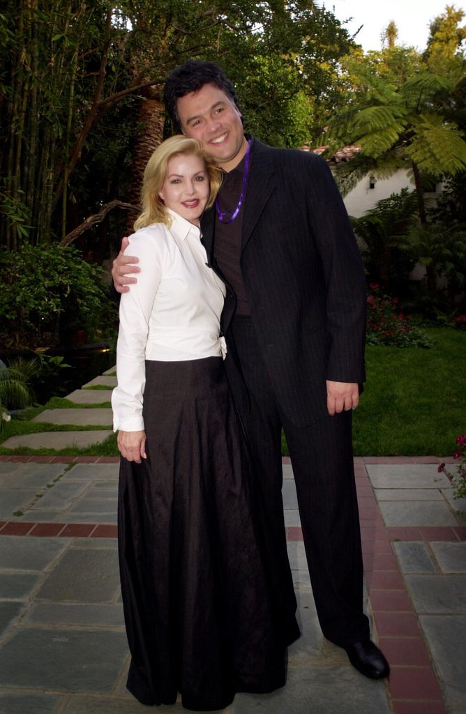 Priscilla Presley with Marco Garibaldi attend the Jubilation 2000 concert June 1, 2000 at the home of producer Alan Ladd Jr. in Beverly Hills, CA
