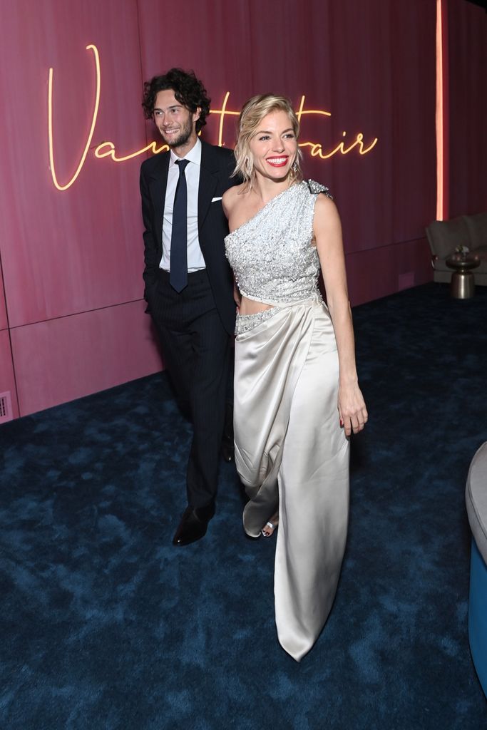 Sienna Miller and Oli Green attend the 2022 Vanity Fair Oscar Party