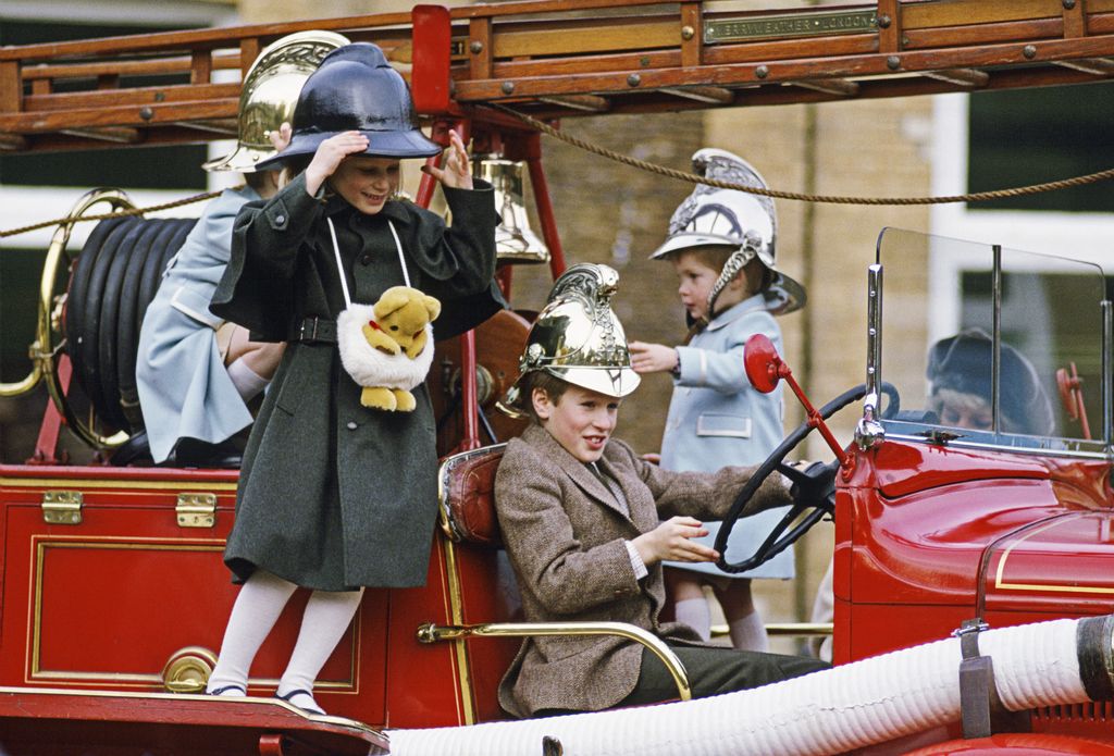 Zara Phillips, Peter Phillips And Prince Harry Playing On A Fire Engine At Sandringham, 1988