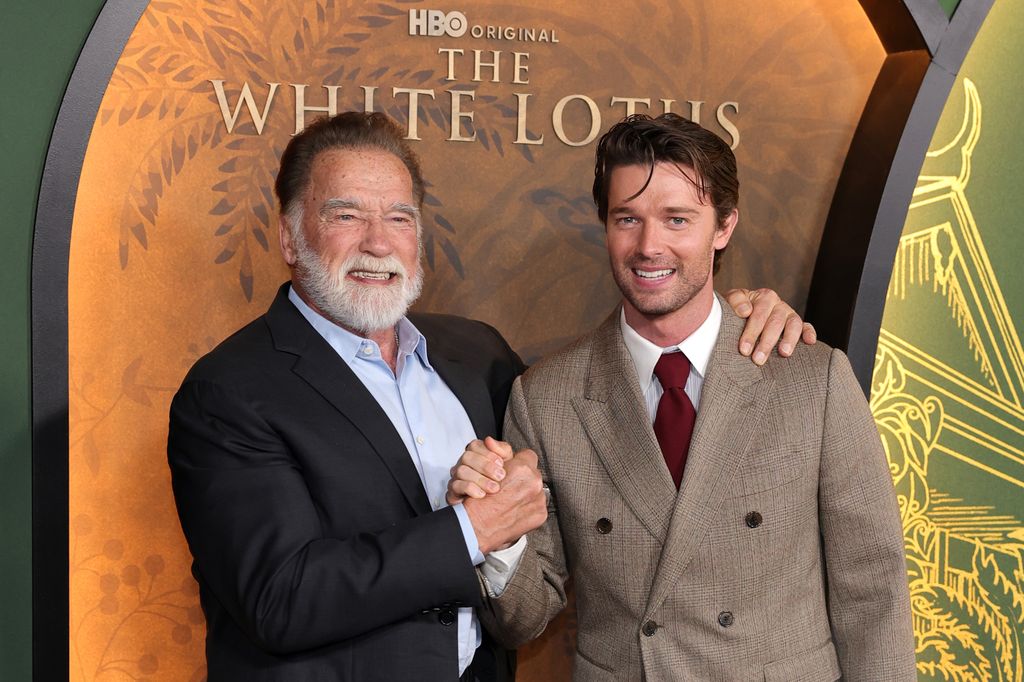 Arnold Schwarzenegger and Patrick Schwarzenegger arrive at the Los Angeles Premiere Of HBO Original Series "The White Lotus" Season 3 at Paramount Theatre on February 10, 2025 in Los Angeles, California