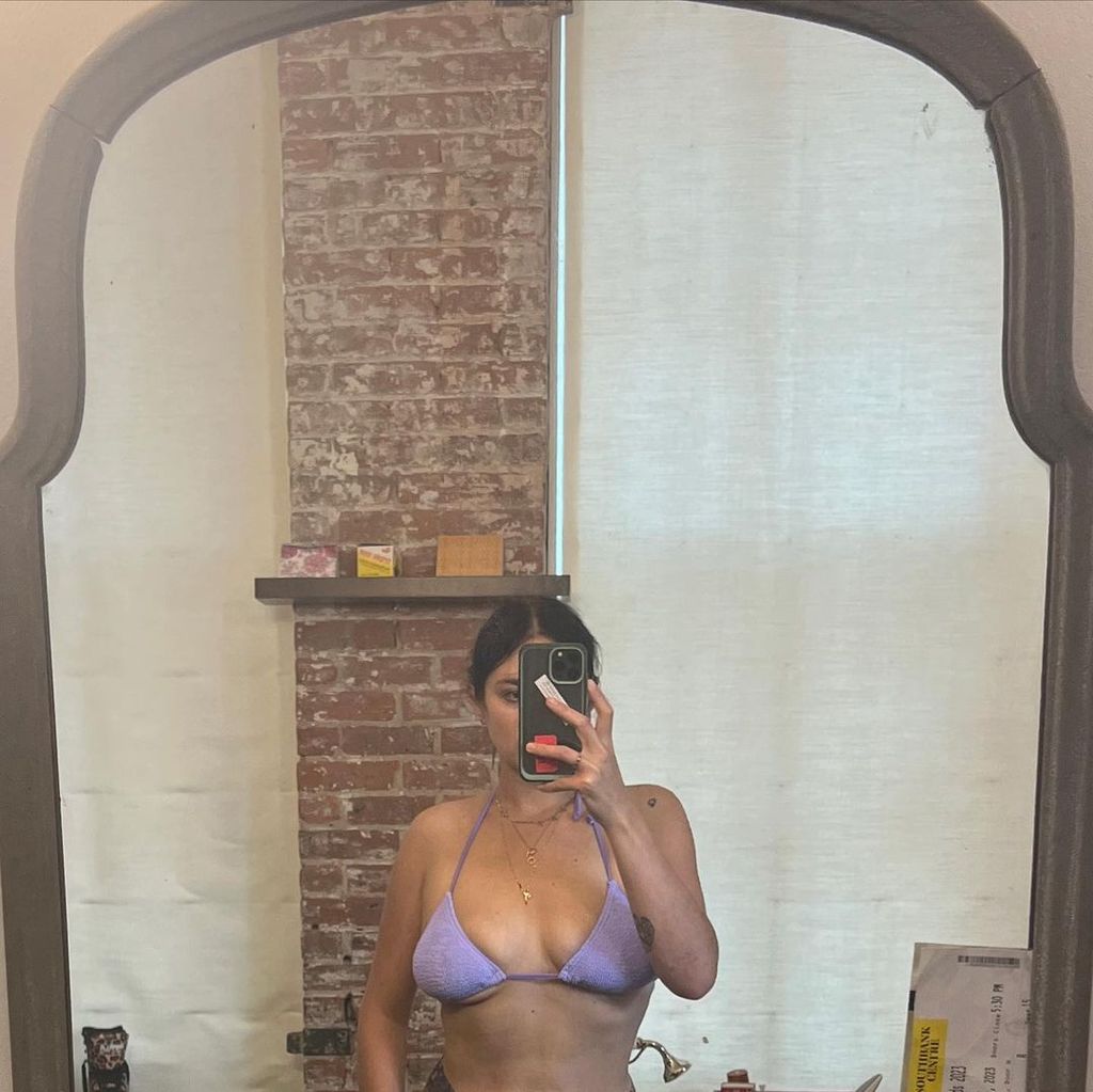 Gracie McGraw stripped down to a bikini inside her New York apartment