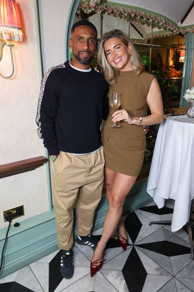 Jermain Defoe and Alisha Lemay in brown dress