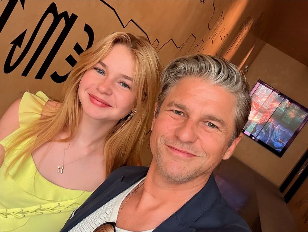 Harper with dad David during their European trip in the summer