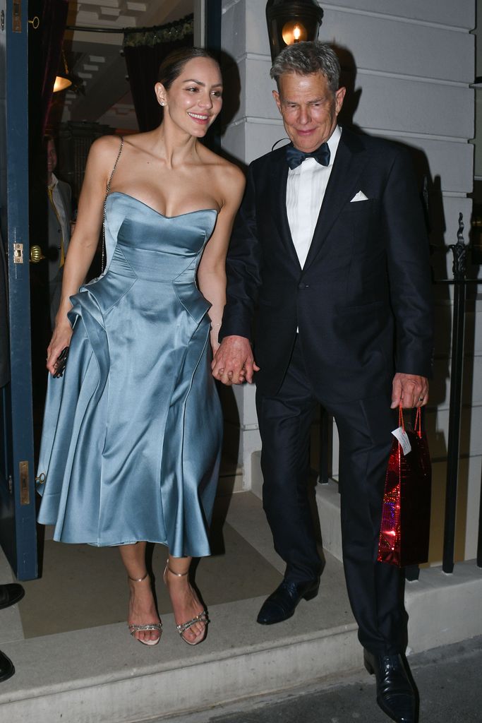Katharine McPhee and David Foster leaving their wedding reception