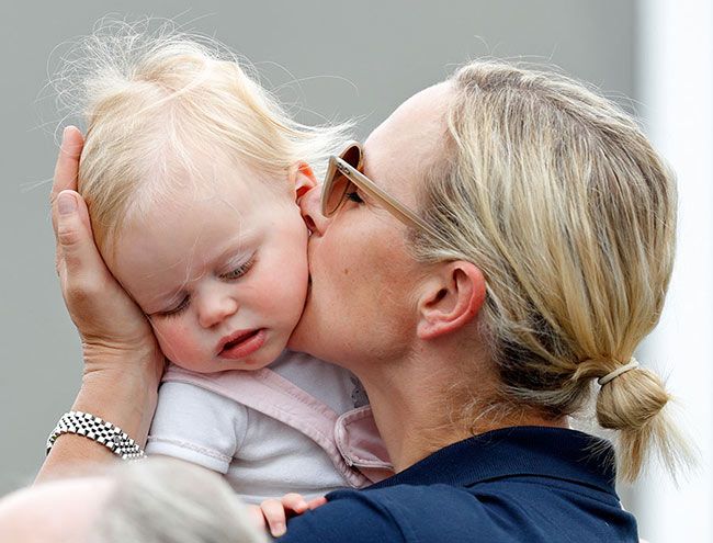 Zara Tindall kisses daughter Lena on the cheek
