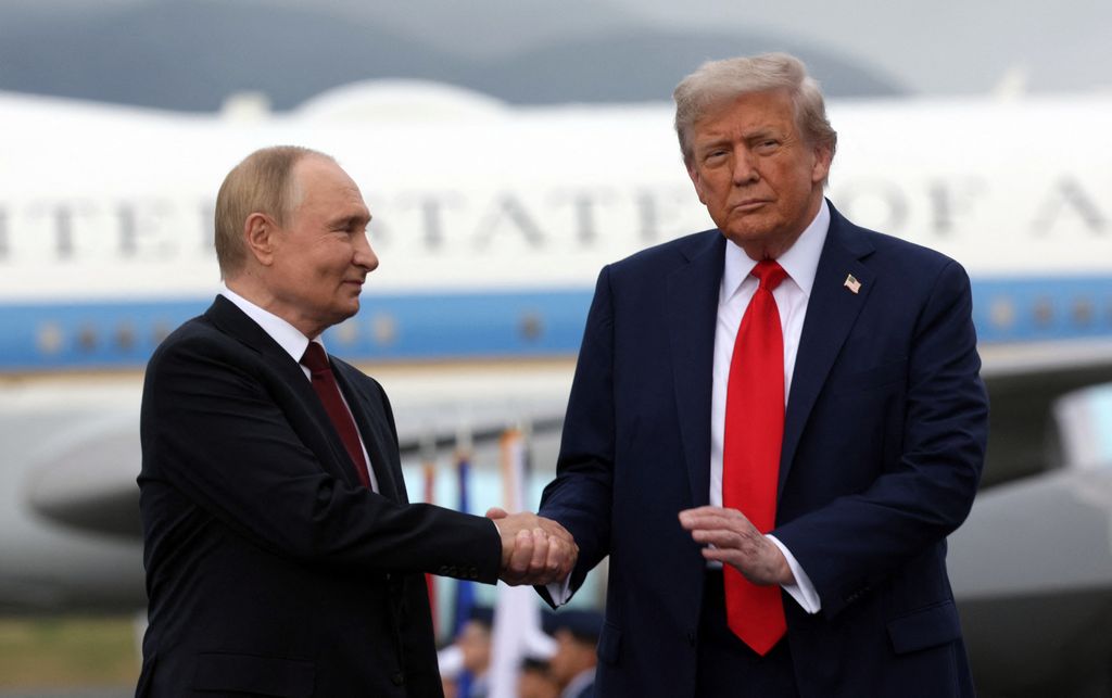 US President Donald Trump and Russian President Vladimir Putin shake hands after their arrival for a US-Russia summit on Ukraine at Joint Base Elmendorf-Richardson in Anchorage, Alaska, on August 15, 2025