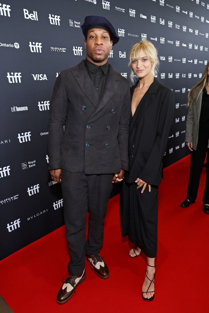 Jonathan Majors and Grace Jabbari attend the Devotion premiere at Cinesphere on September 12, 2022 in Toronto, Ontario