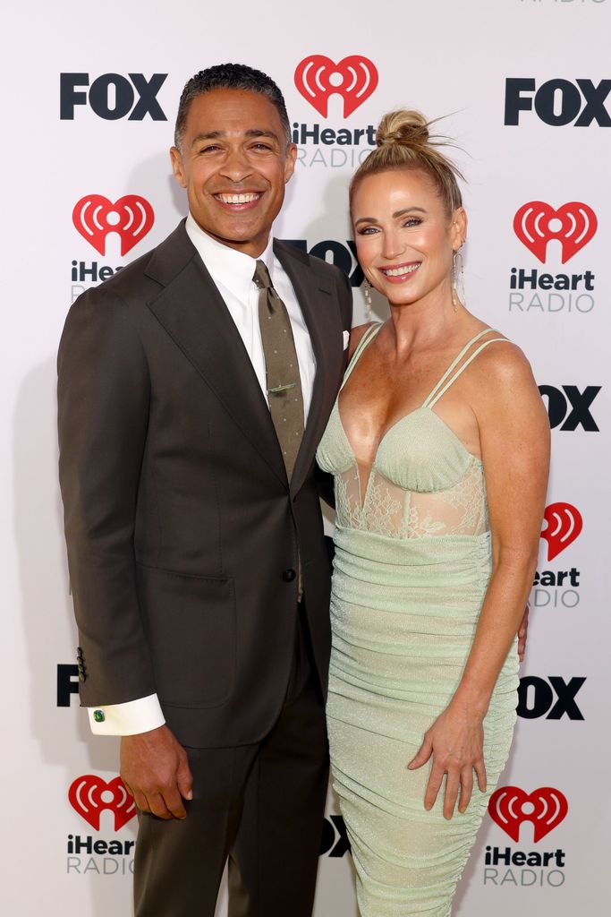 T. J. Holmes and Amy Robach attend the 2024 iHeartRadio Music Awards at Dolby Theatre in Los Angeles, California on April 01, 2024. Broadcasted live on FOX.