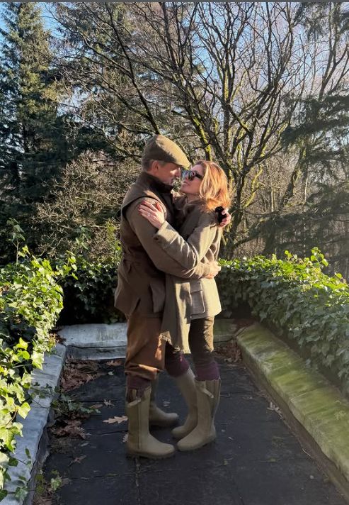 Mark Wilson and Sophie Stanbury embracing each other
