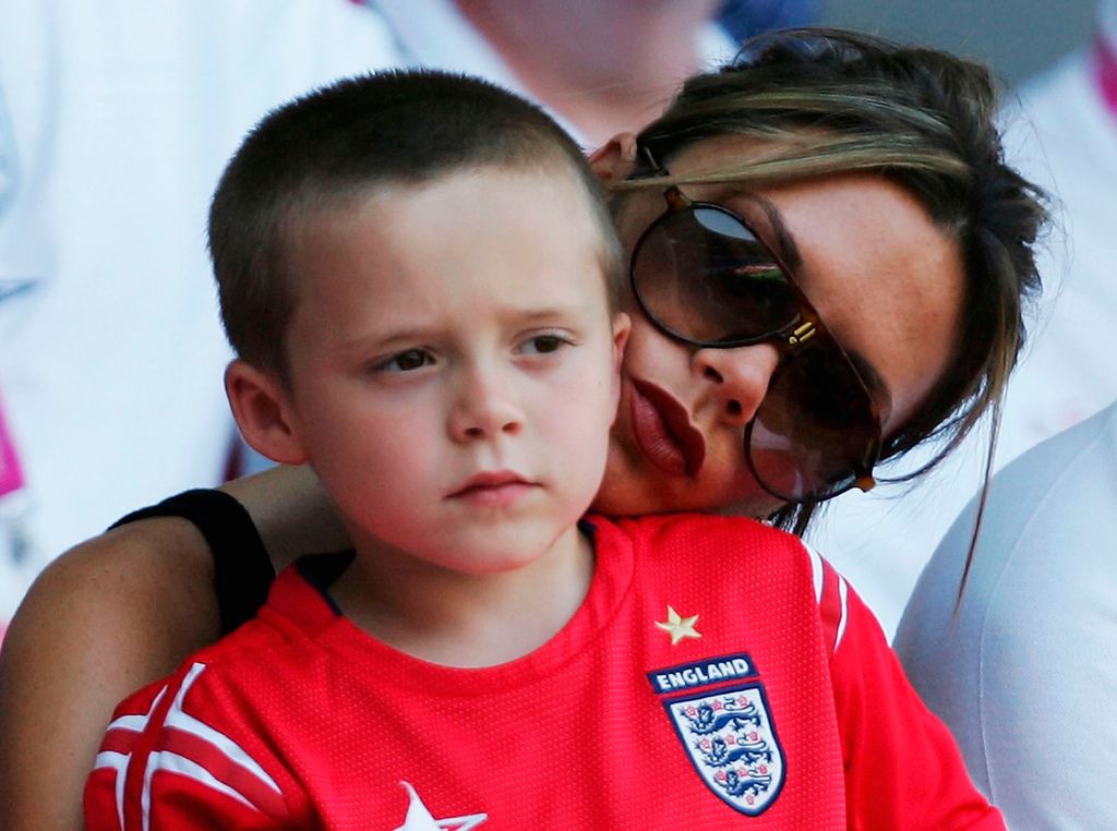 Victoria Beckham with her son Brooklyn in 2004