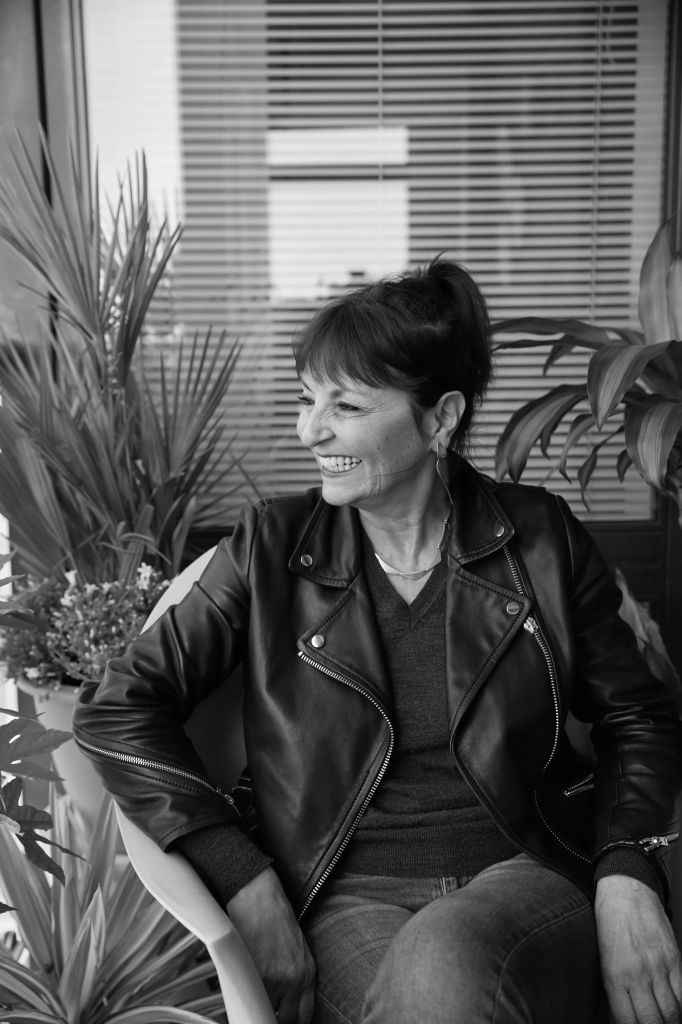 Susan Caplan in a leather jacket