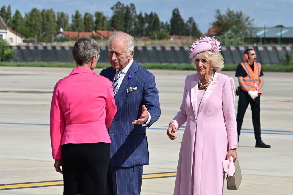 Charles and Camilla arrive at Orly Airport