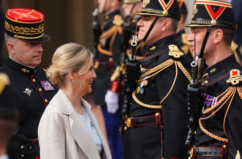Duchess of Sophie smiles as she inspects guard of honour