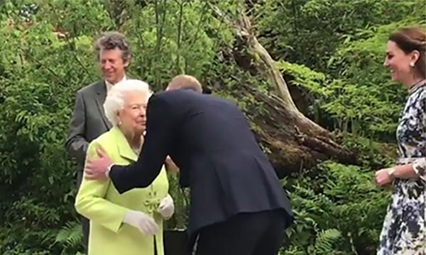 Prince William kisses the Queen