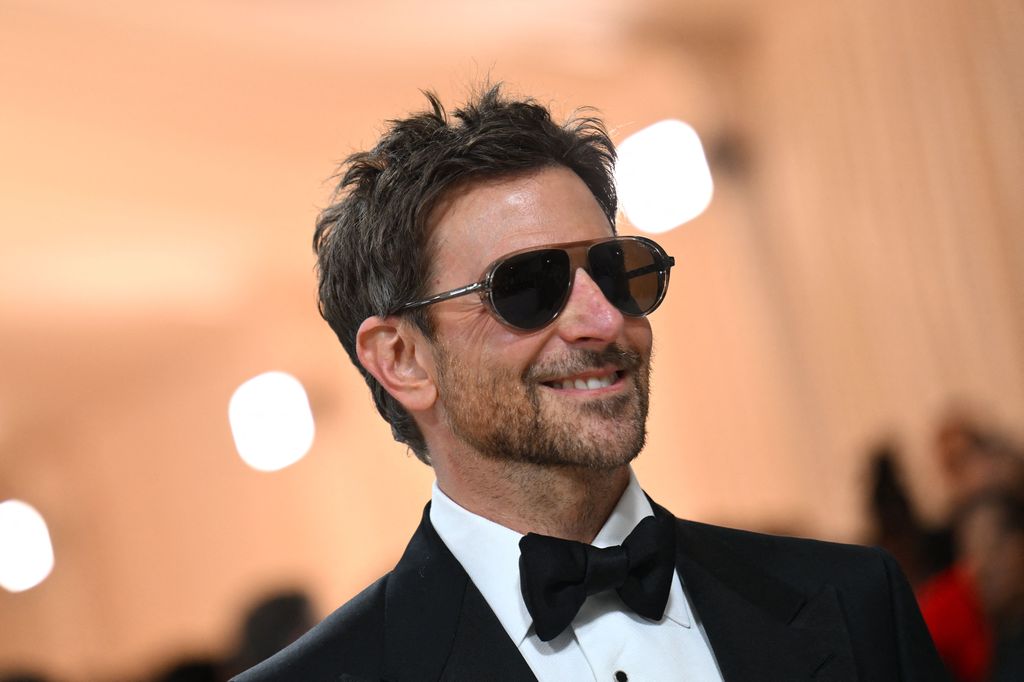 Bradley Cooper in a tuxedo and sunglasses