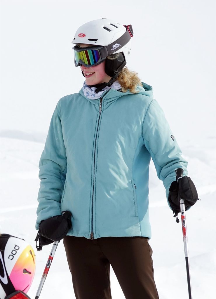 Lady Louise Windsor smiling in a light blue ski jacket