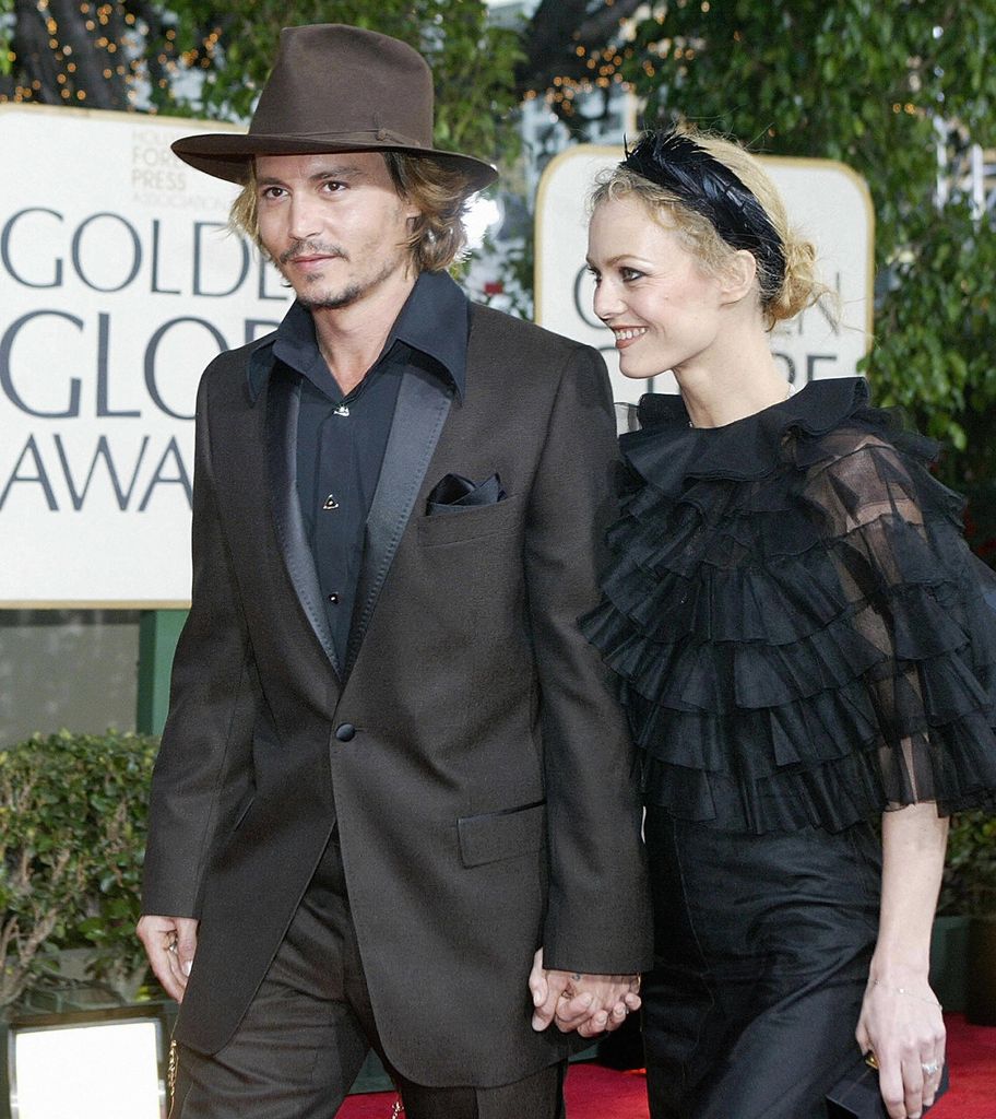 Johnny Depp with Lily Rose Depp at the Golden Globes in 2004