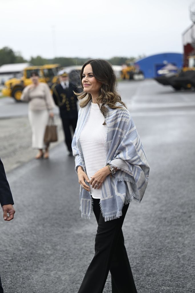 Princess Sofia wearing poncho and white top 