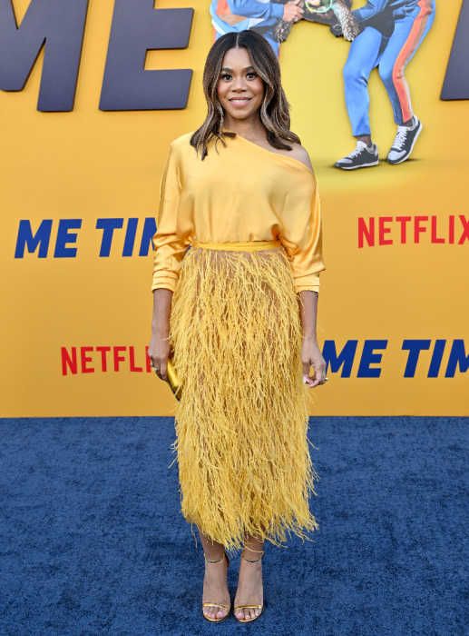 regina hall me time yellow feather skirt red carpet