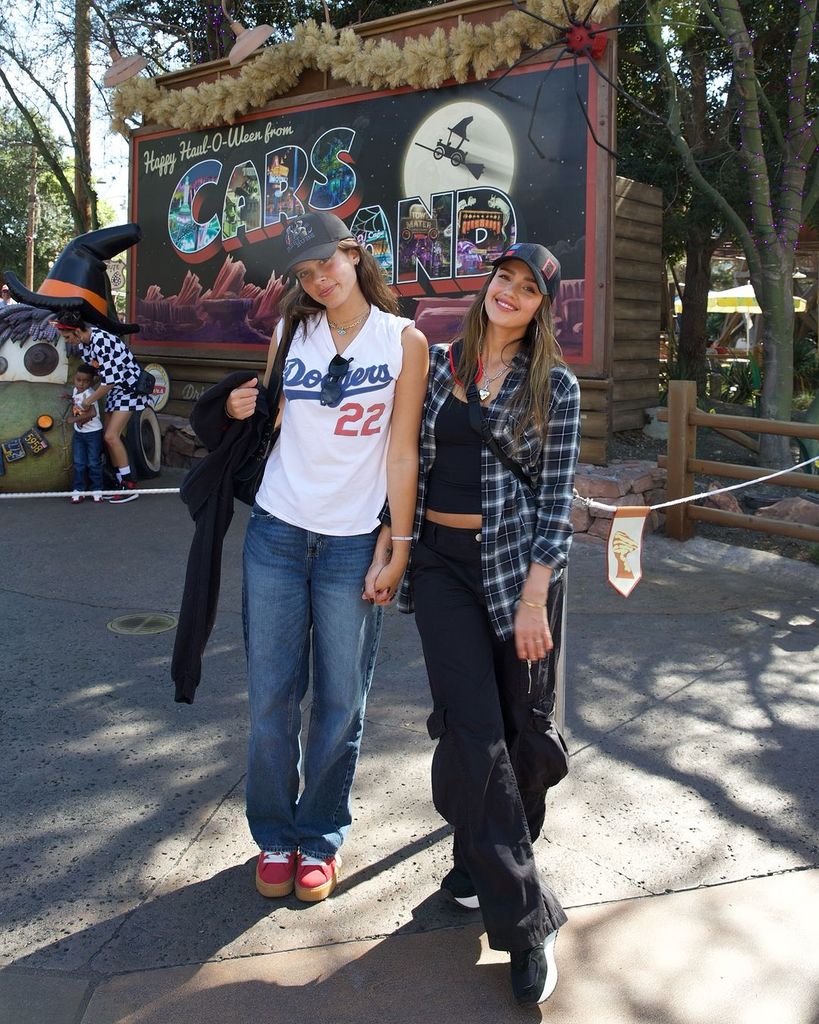 Jessica Alba and daughter Honor stand in front of Cars Land at Disneyland