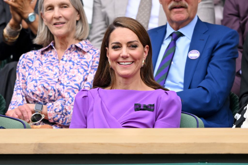 Kate Middleton laughing court-side of Centre Court during Wimbledon