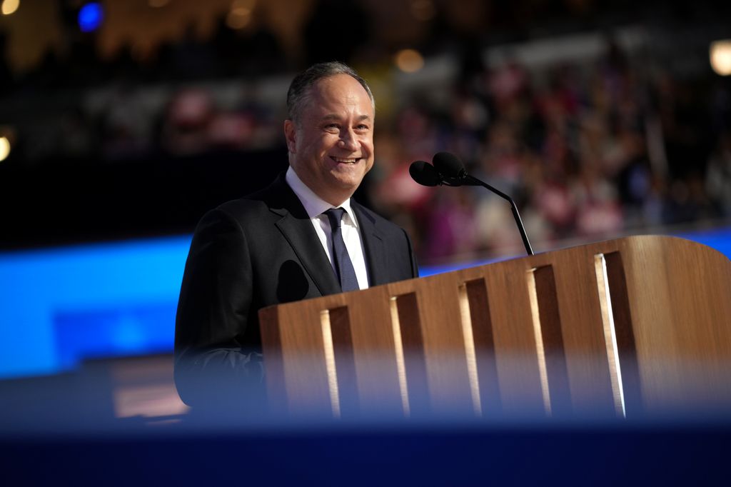 Second gentleman Doug Emhoff speaks on stage during the second day of the Democratic National Convention 