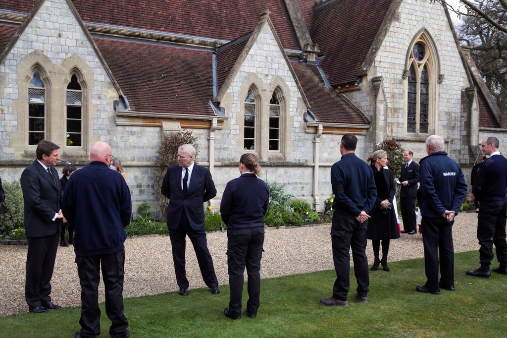 Prince Andrew and Duchess Sophie talk with Crown Estate staff as they attend the Sunday service at the Royal Chapel of All Saints