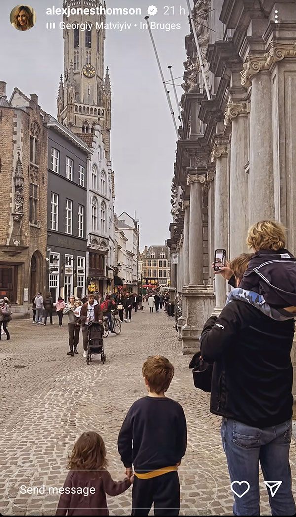alex jones and family walking through Bruges 