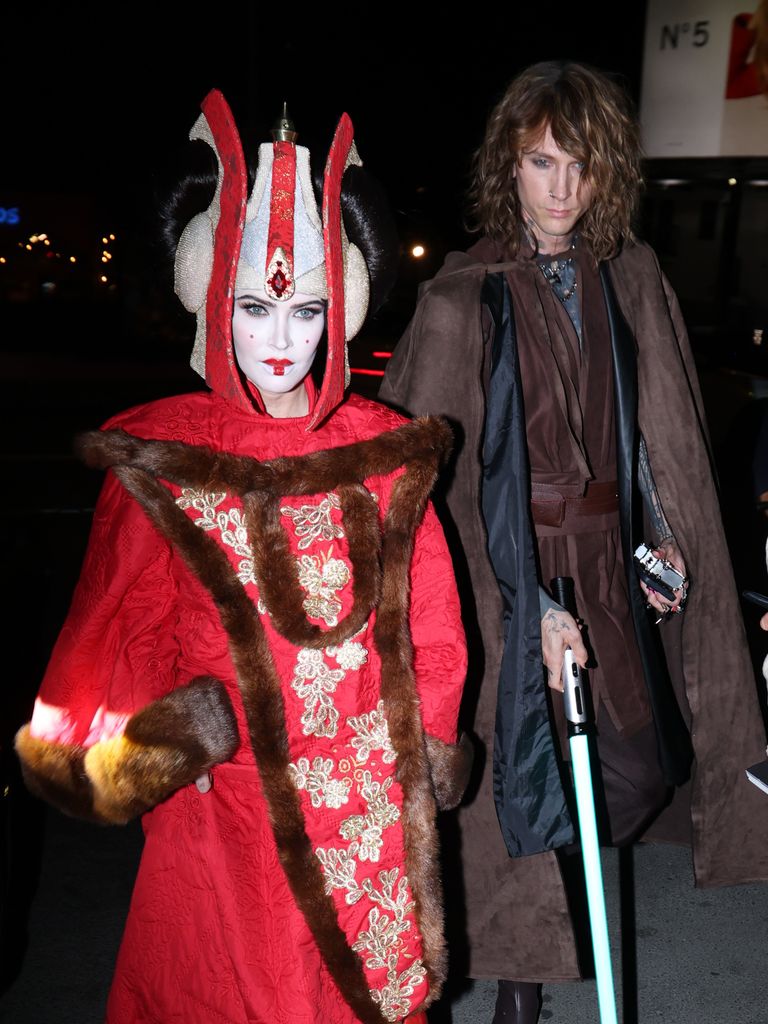 Megan Fox and Machine Gun Kelly are seen arriving at the Chateau Marmont on October 31, 2024 in West Hollywood, California dressed as Anakin Skywalker and Padmé Amidala