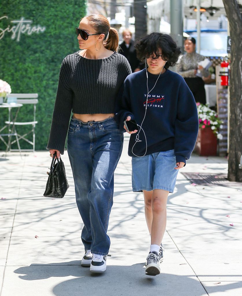 Jennifer Lopez and her child Emme Muniz walking