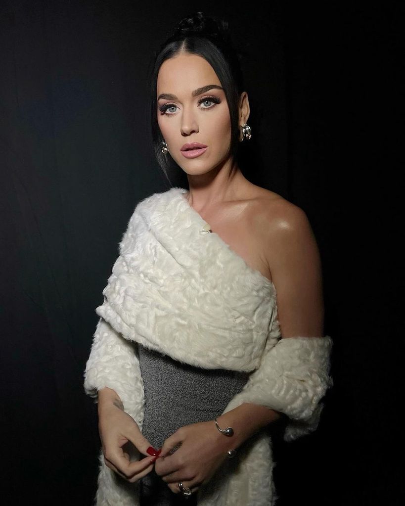 Katy Perry in knitted dress looking at the camera