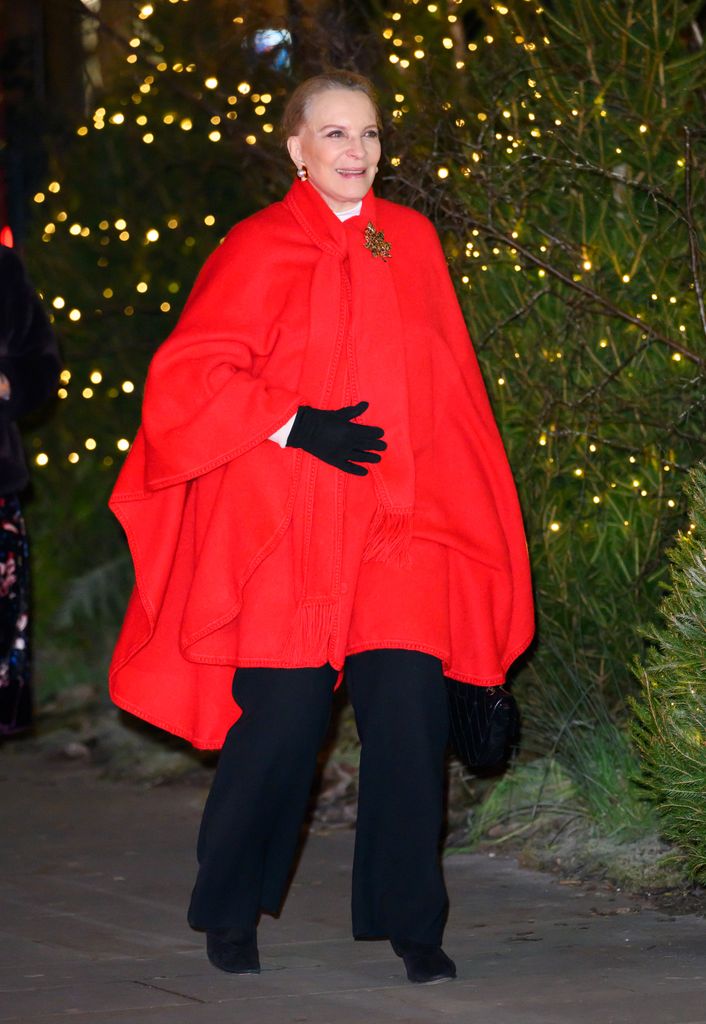 Princess Michael of Kent in a large red coat and black gloves