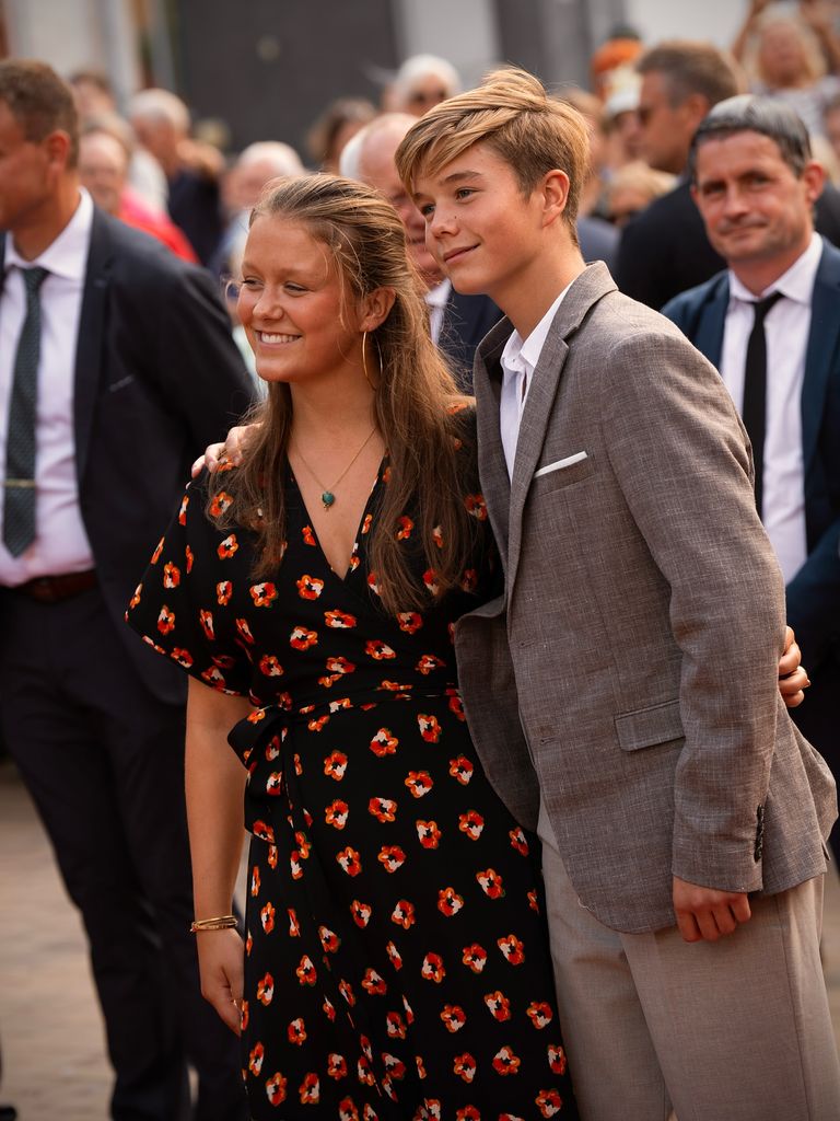 Prince Vincent poses with his arm around sister Isabella