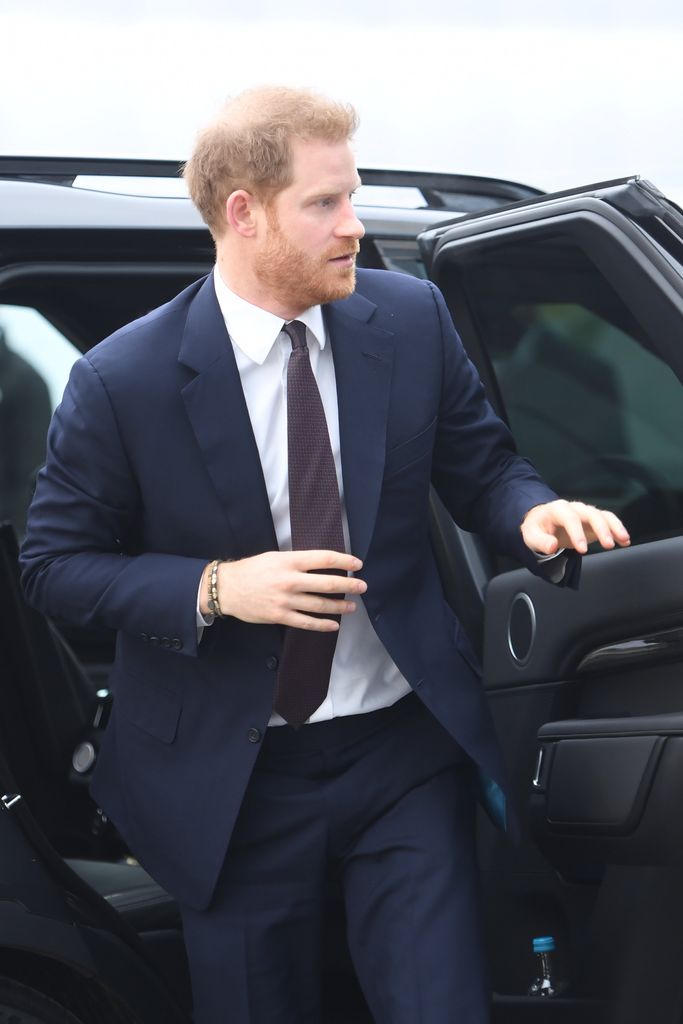 Prince Harry steps out of his car in Greenwich