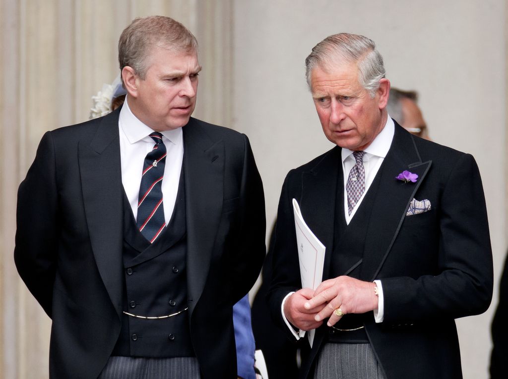 King Charles and Prince Andrew talking