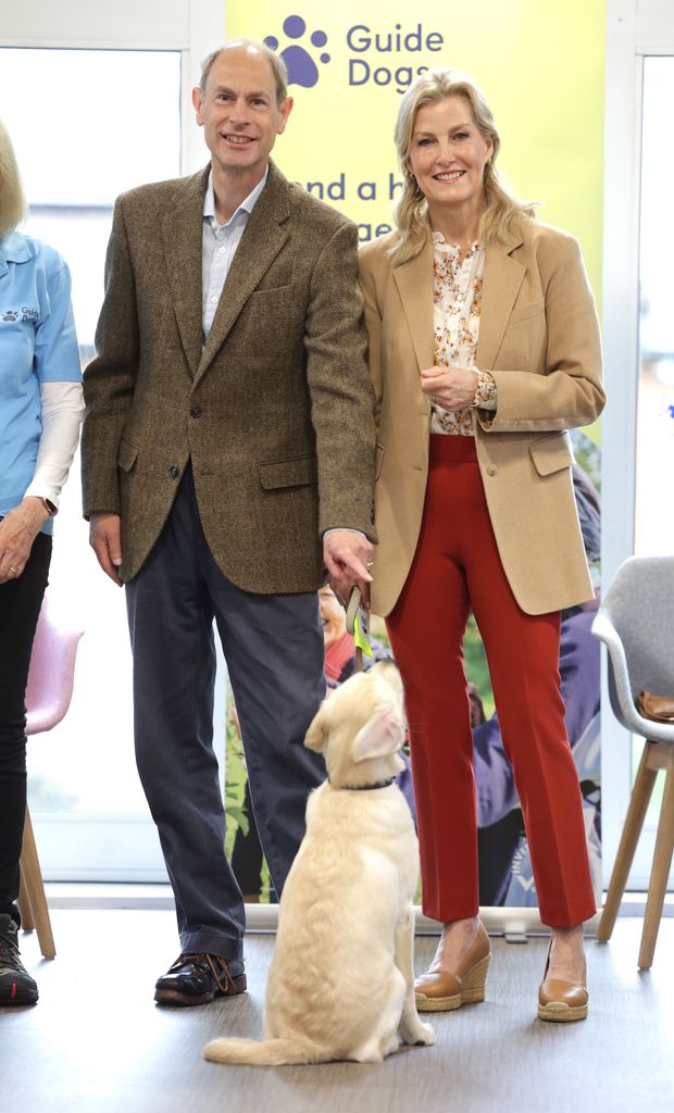 The Duke of Edinburgh and Sophie, the Duchess of Edinburgh took part in a puppy class at the Guide Dogs for the Blind Association Training Centre at a pop-up Coronation Cafe.