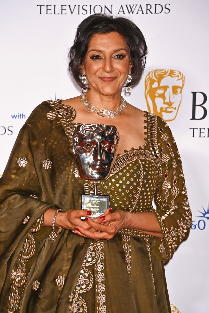 Meera Syal, winner of the Fellowship award, poses in the Winner's Room at the 2023 BAFTA Television Awards