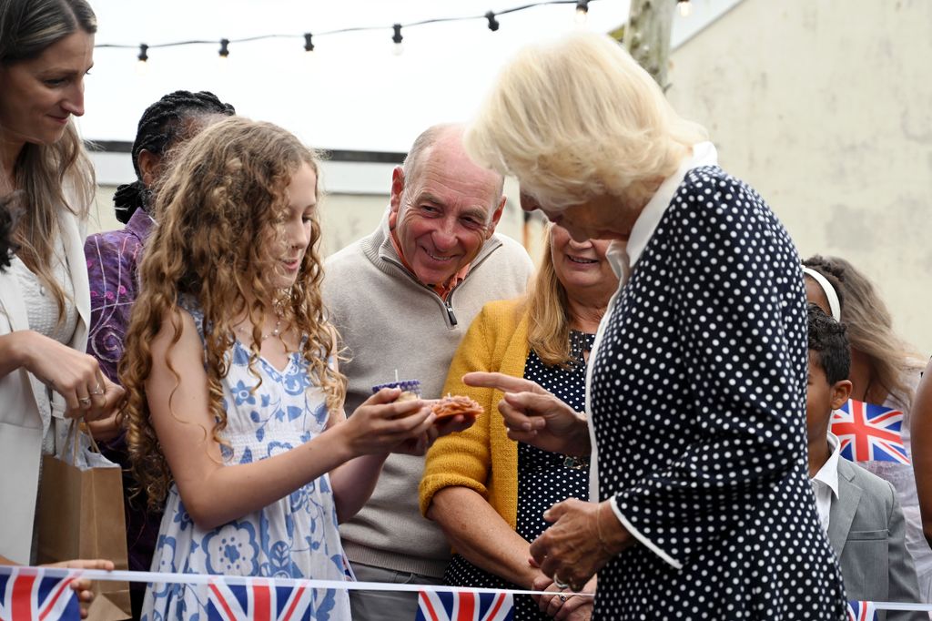 Queen Camilla meets members of the public during her visit to Wave House Church to see local projects supported by the Cornwall Community Foundation on September 02, 2025 in Newquay, England 