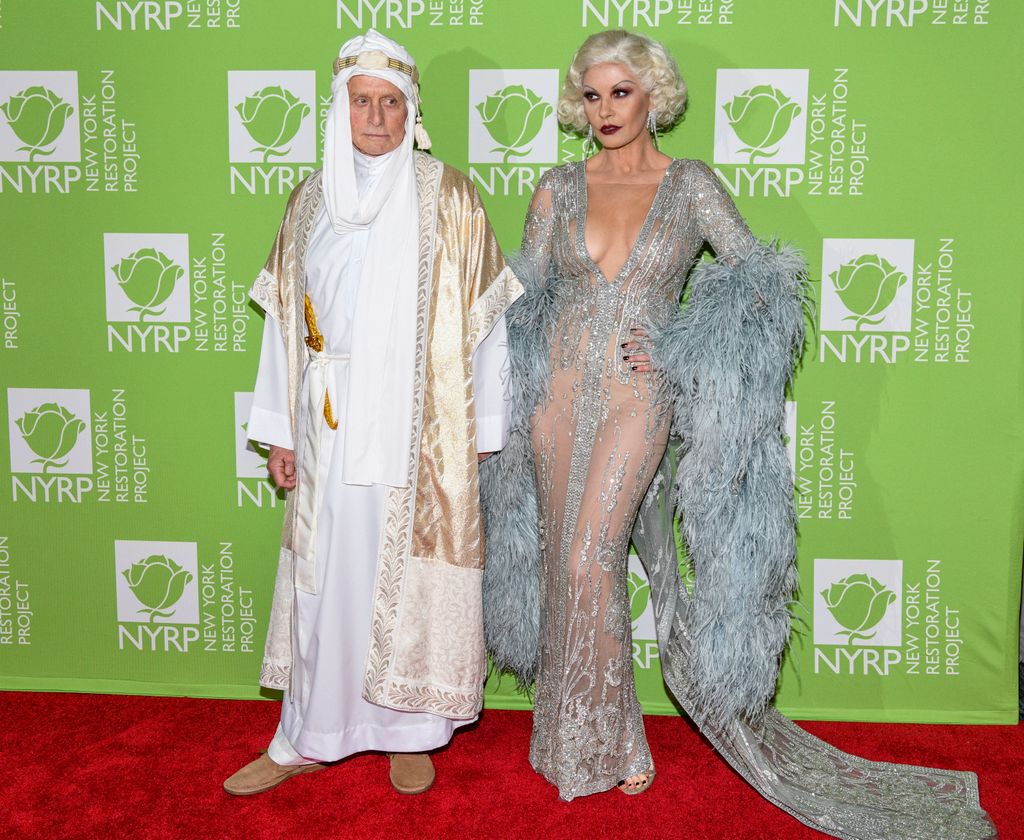 couple posing on red carpet