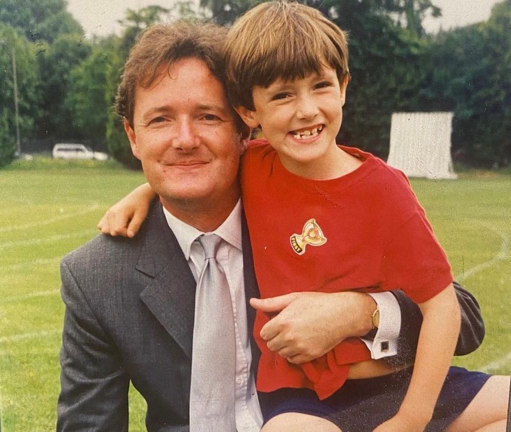 Piers Morgan with his young son Spencer in a red top