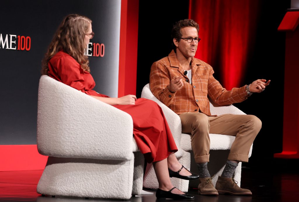 Ryan Reynolds (R) speaks onstage during the 2025 TIME100 Summit at Jazz at Lincoln Center on April 23, 2025 in New York City