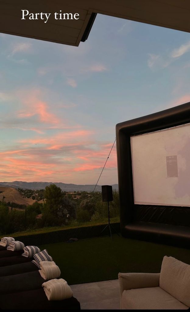 rooftop cinema with a sunset behind