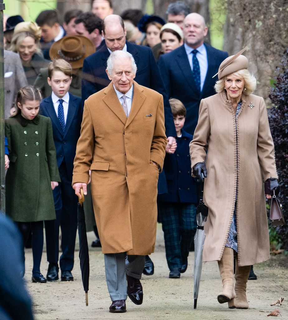 King Charles walking in front of Prince William, Prince George, Princess Charlotte and Prince Louis