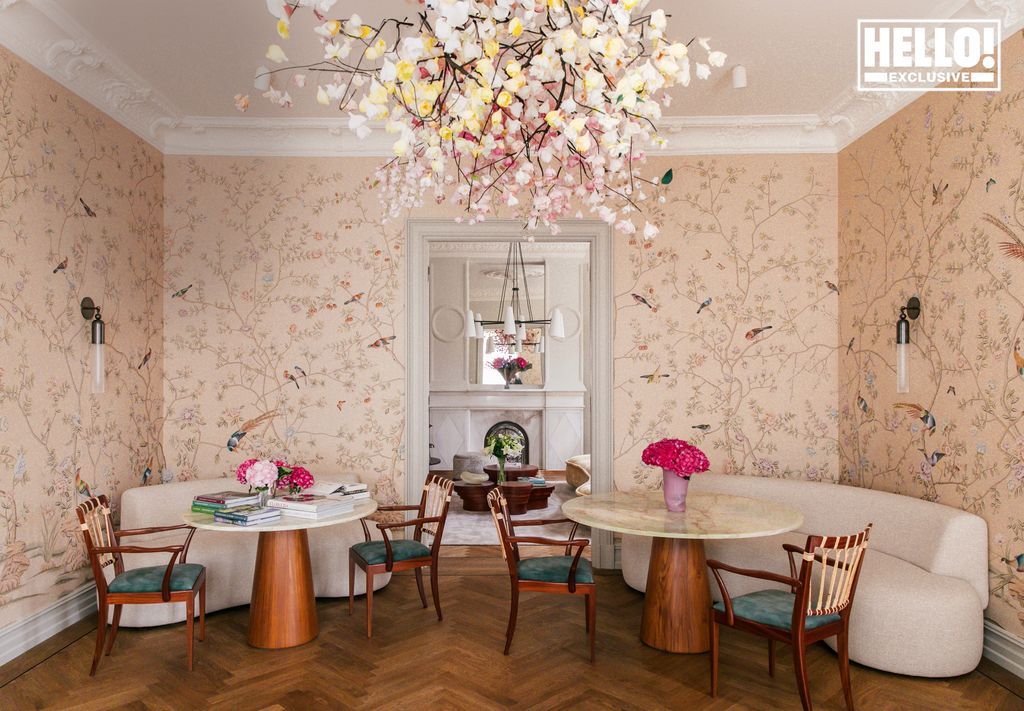 Camilla Austad Knutsen's floral dining room with tables and chairs at Oslo home