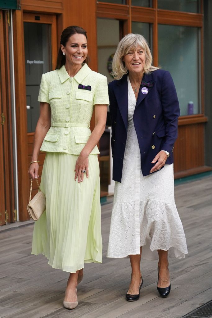 Kate Middleton walking with a woman