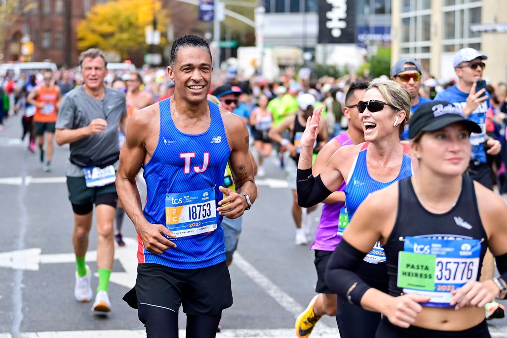 NEW YORK, NEW YORK - NOVEMBER 06: TJ Holmes and Amy Robach run during the 2022 TCS New York Road City Marathon on November 06, 2022 in New York City. (Photo by Roy Rochlin/New York Road Runners via Getty Images)