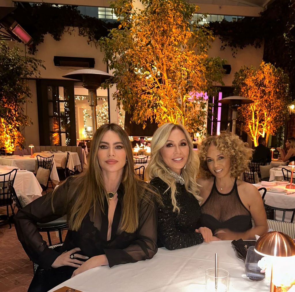 Sofia Vergara at table in restaurant with Anastasia and friend