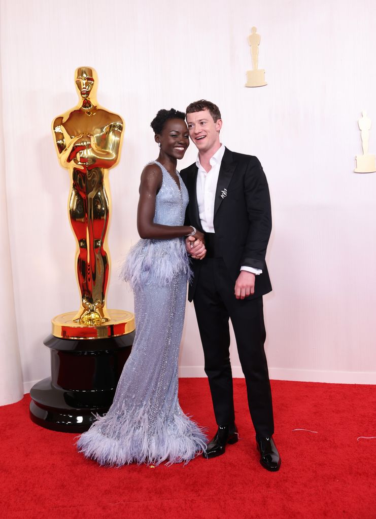 Lupita Nyong'o and Joseph Quinn on the red carpet at the 96th Annual Academy Awards in Dolby Theatre at Hollywood & Highland Center in Hollywood, CA, Sunday, March 10, 2024. (Christina House / Los Angeles Times via Getty Images)