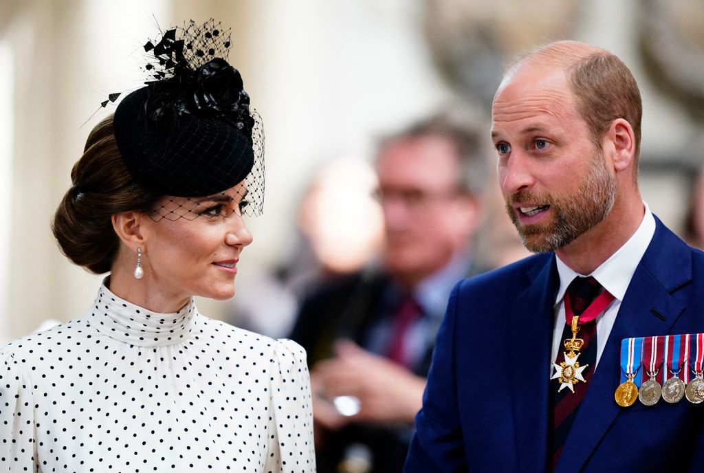 Princess Kate glances over at Prince William        